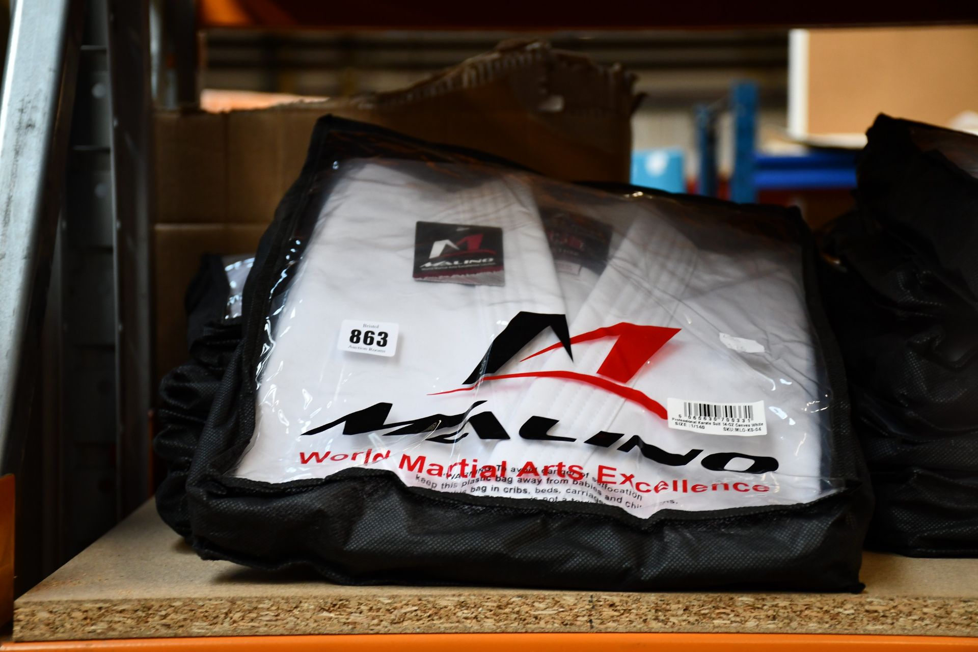 Five as new Malino Professional Karate suits in canvas white (140cm).