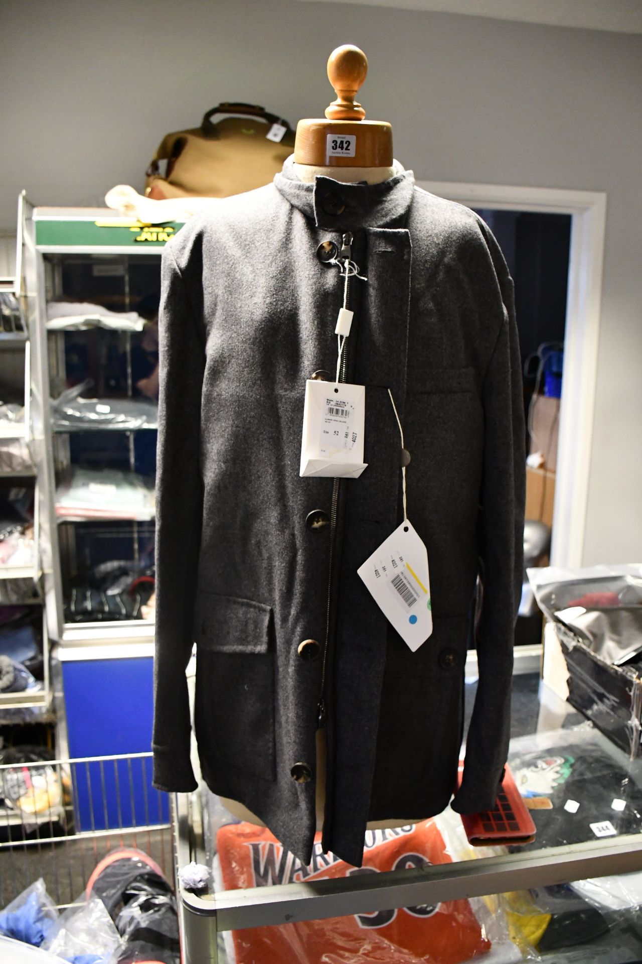An as new Salvatore Ferragamo wool jacket in grey (Size 52).