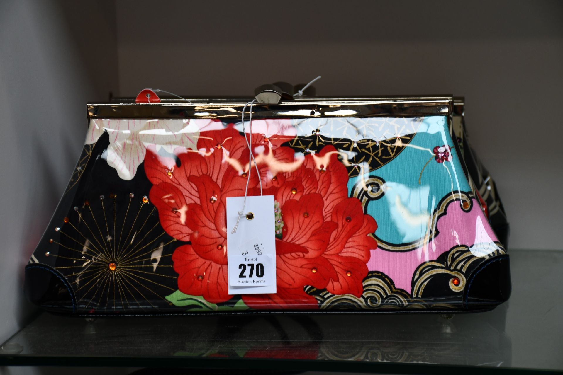Three as new M.andonia clutch bags and small cosmetic bag with oriental flower design and