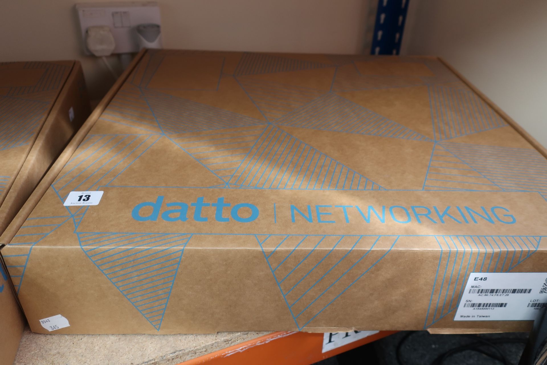 A boxed as new Datto Networking E48 48 Port Switch (Serial: A1845000133).