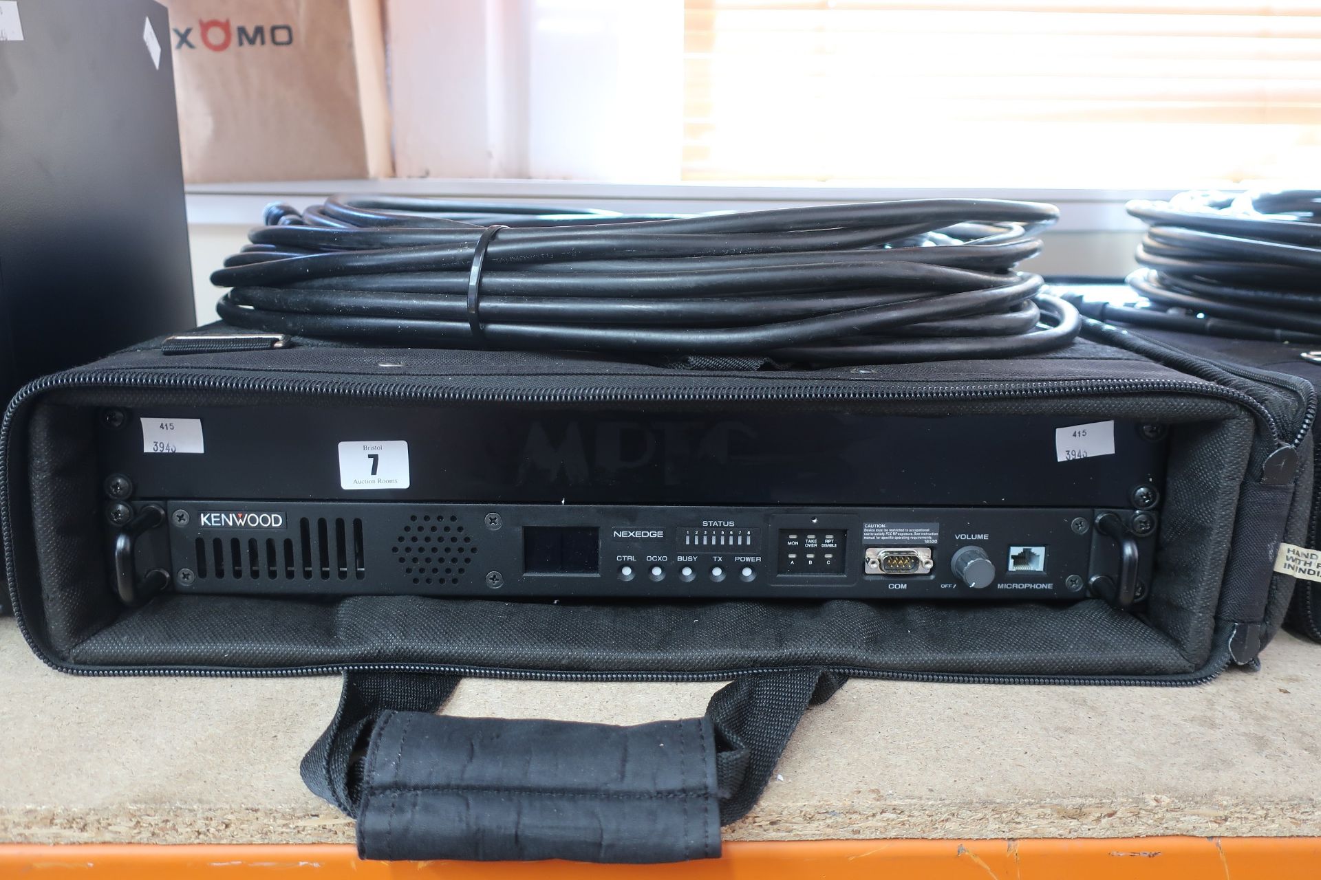 A pre-owned Kenwood NXR-700 NEXEDGE digital and analogue base station repeater in protective carry
