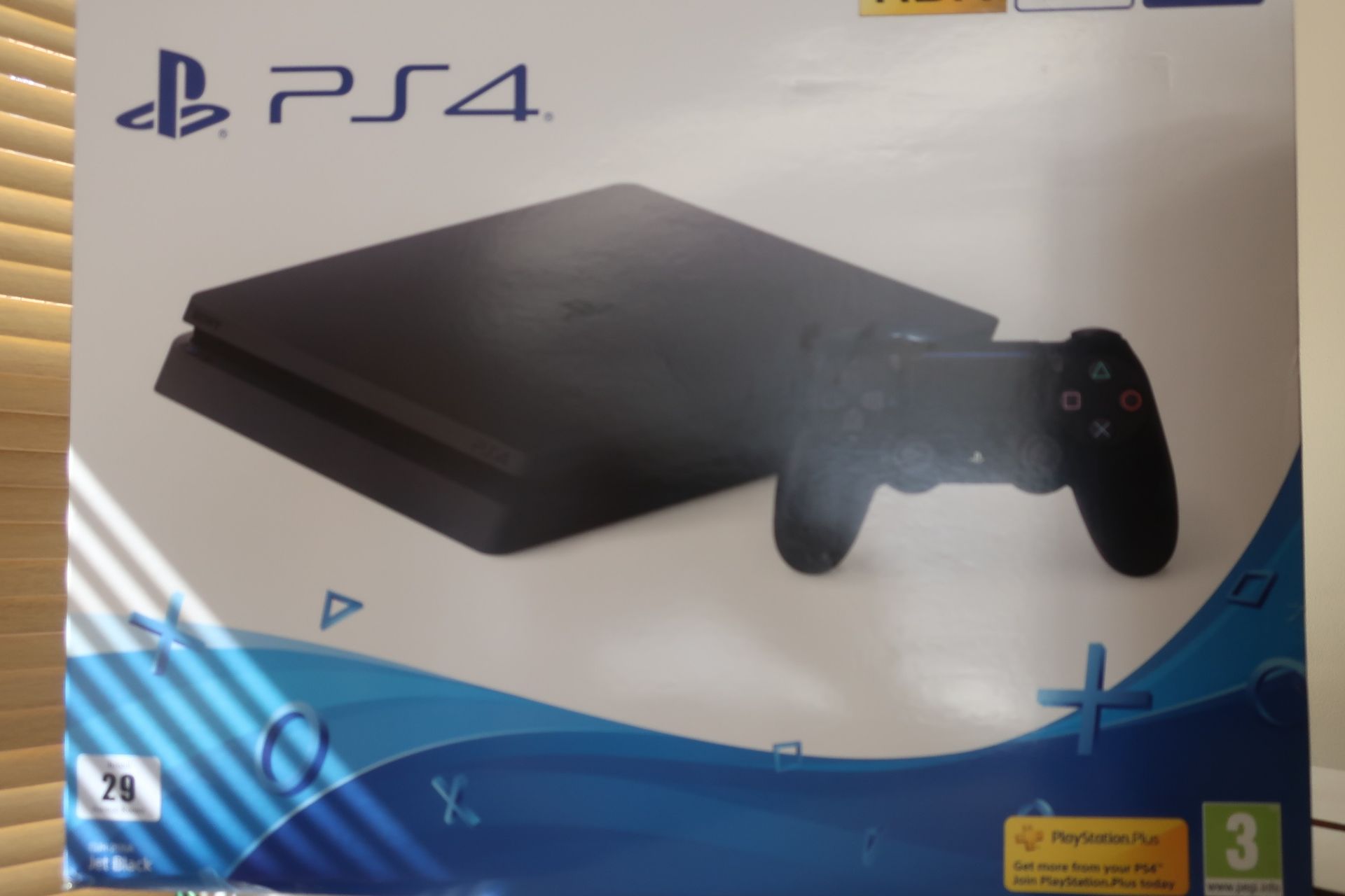 A boxed as new Sony Playstation PS4 Slim 500GB (Model: CUH 2116A) (Box sealed).