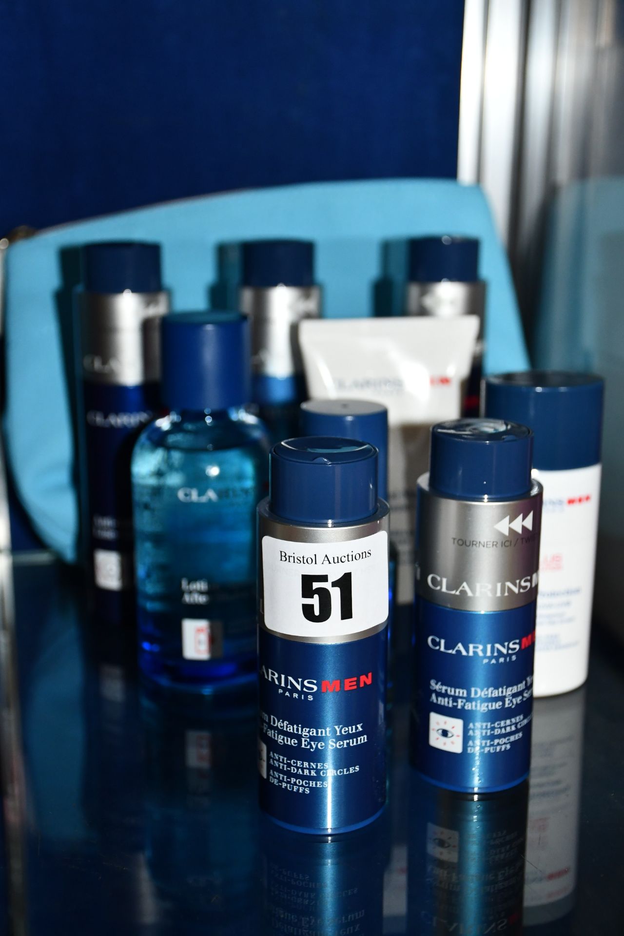 Men's assorted Clarins products to include anti-fatigue eye serum, line control balm, line control