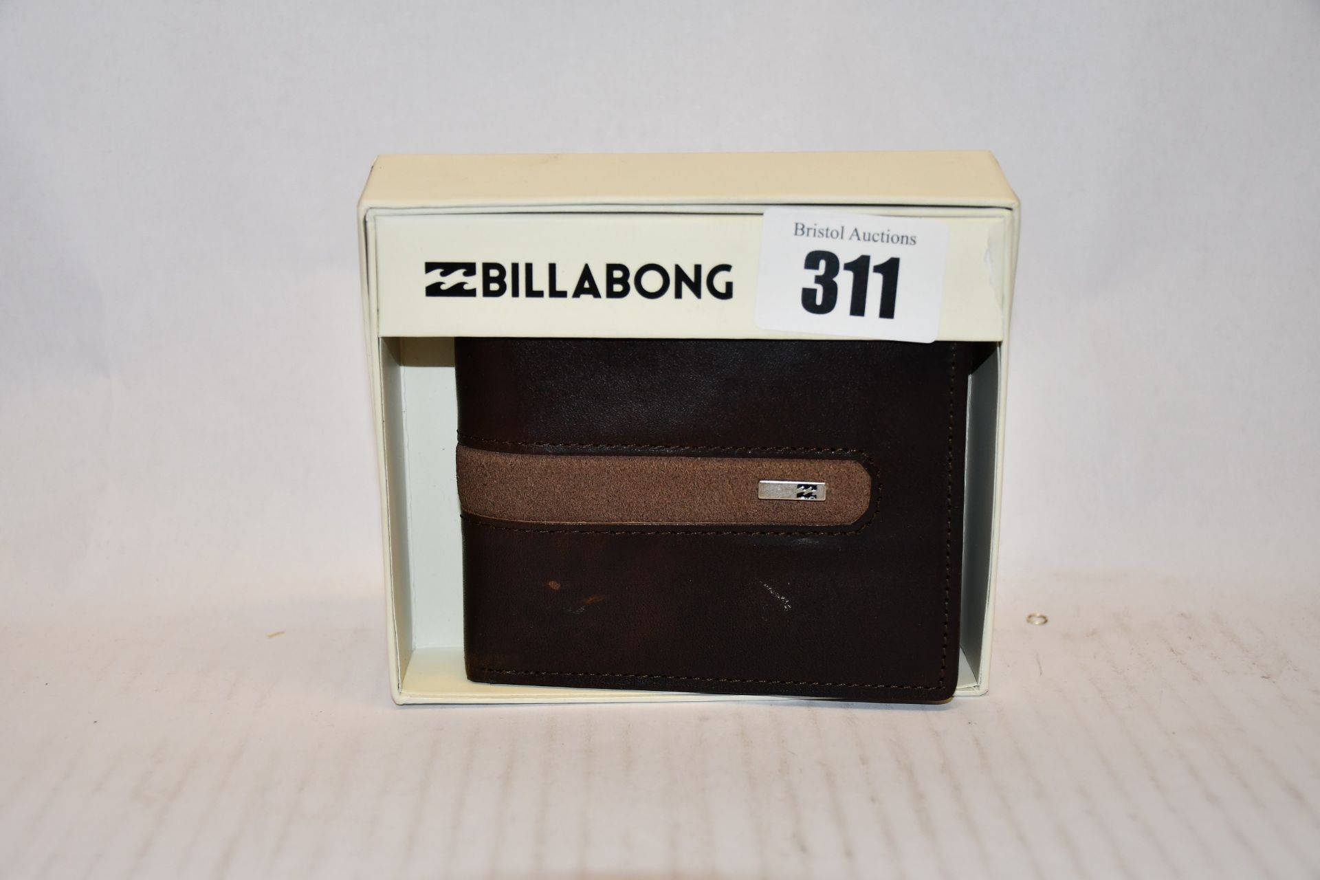 Two as new Billabong leather wallets (RRP £35 each).