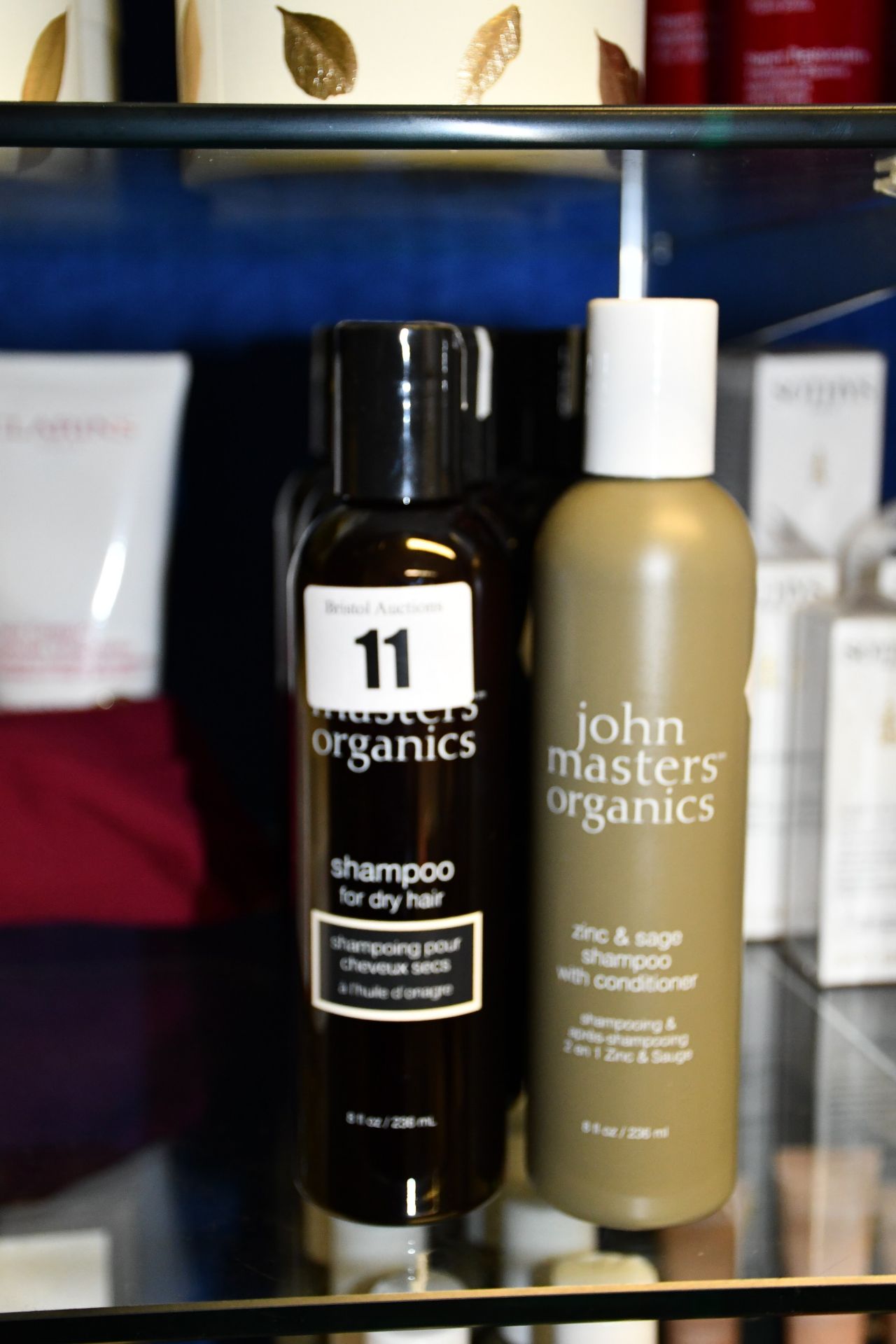 Nine bottles of as new John Masters Organics shampoo for dry hair (236ml) and one bottle of as new