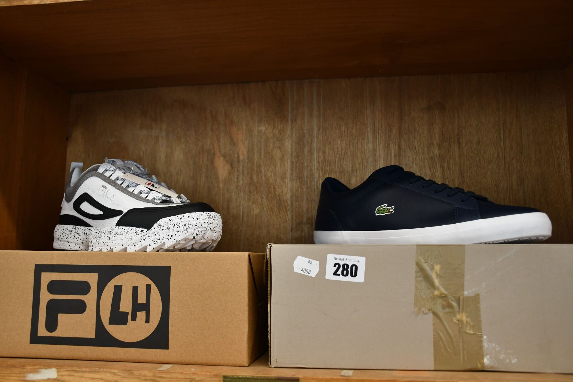 A pair of as new Lacoste Lerond trainers (UK 11) together with a pair of Fila LH ML3 Disruptor