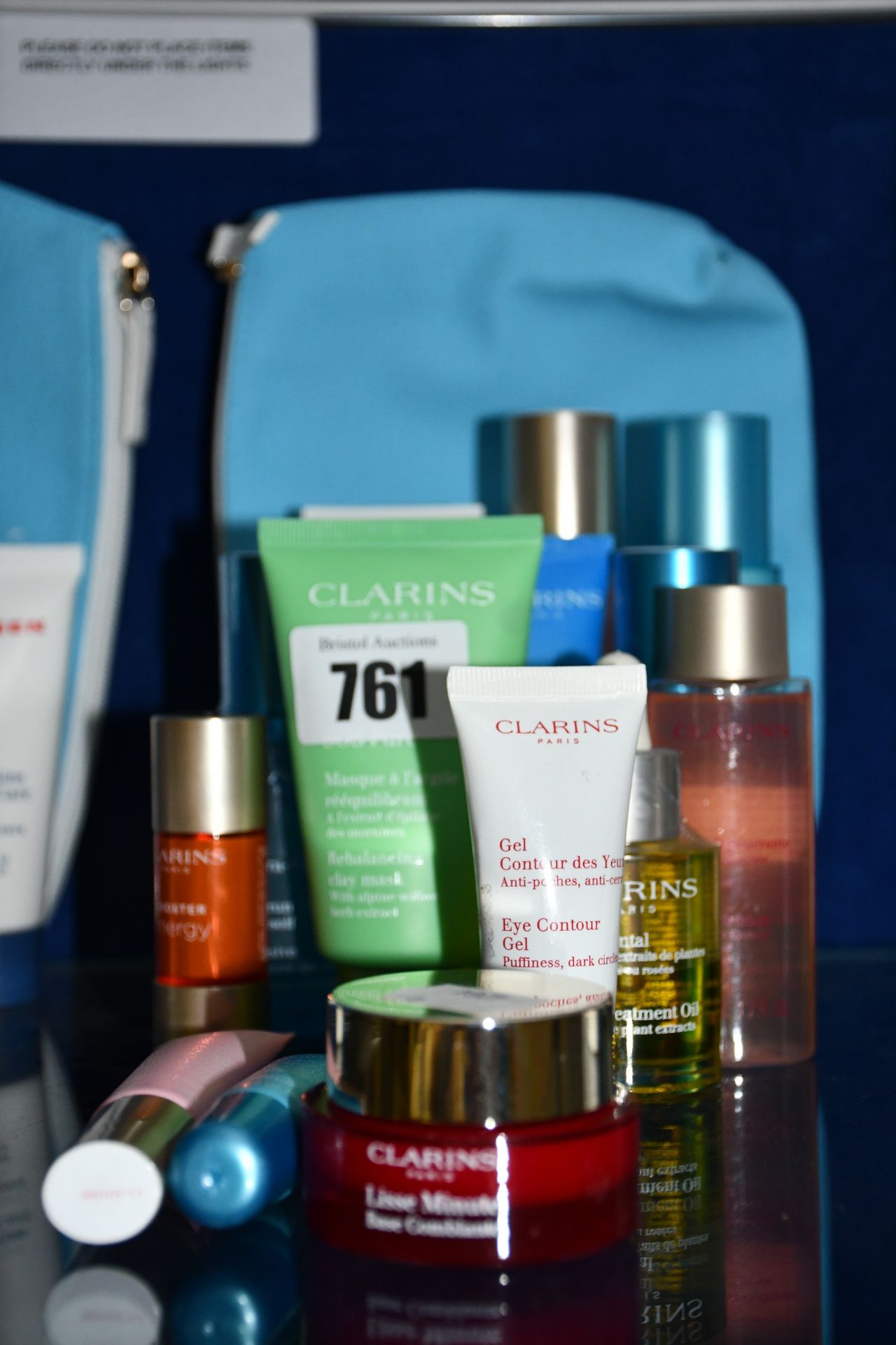 Fourteen items of Clarins toiletries/skin care to include smooth away cream, rebalancing clay