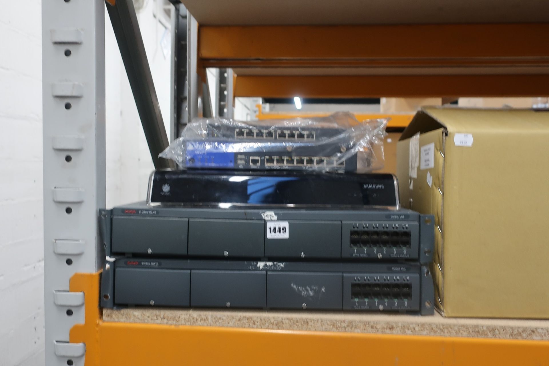 Two Avaya IP office 500 v2 control units, a Samsung SMT-G7400/XEN router, a Juniper SRX210