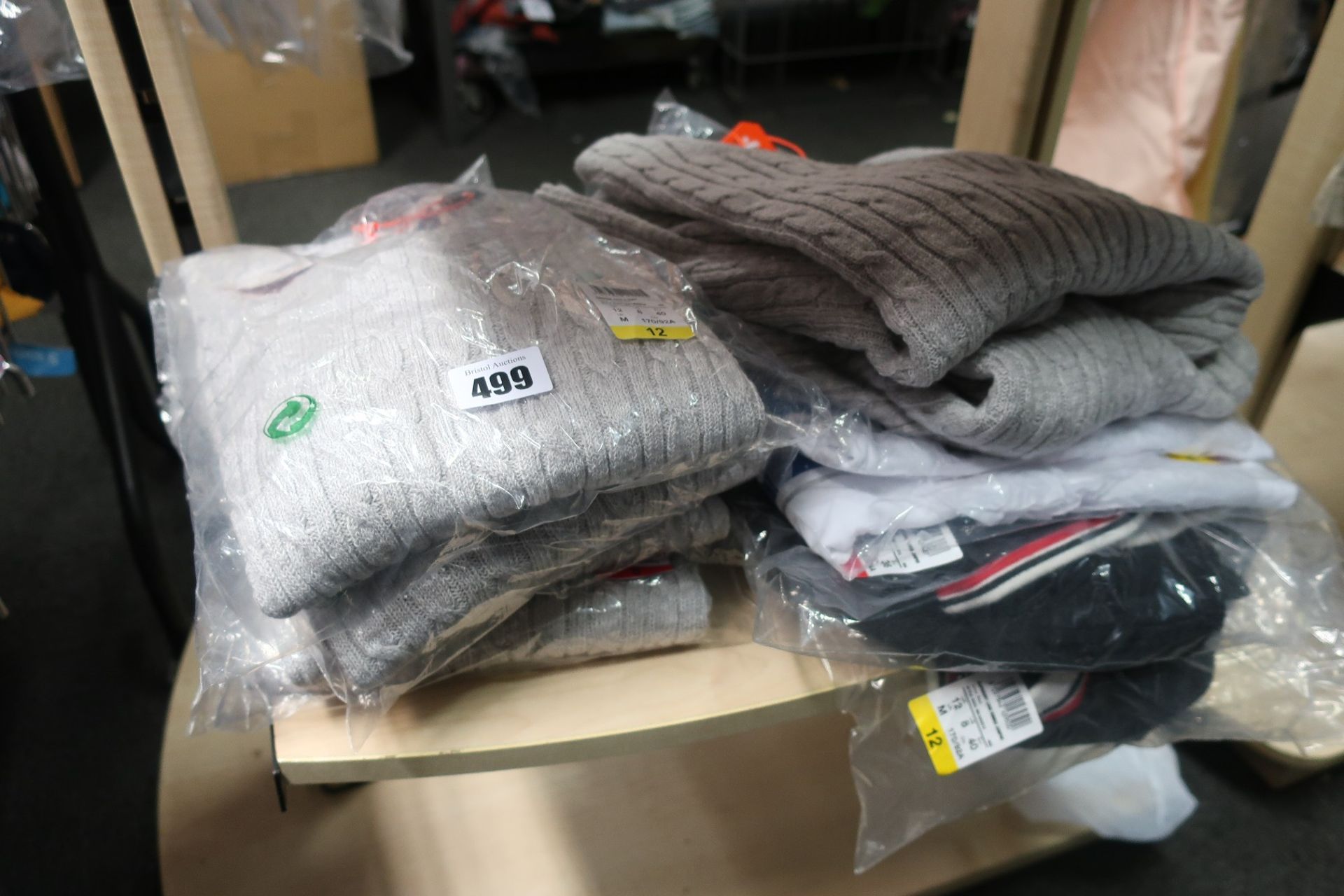 A quantity of lady's as new Superdry clothing to include four Croyde cable knit jumpers in grey (
