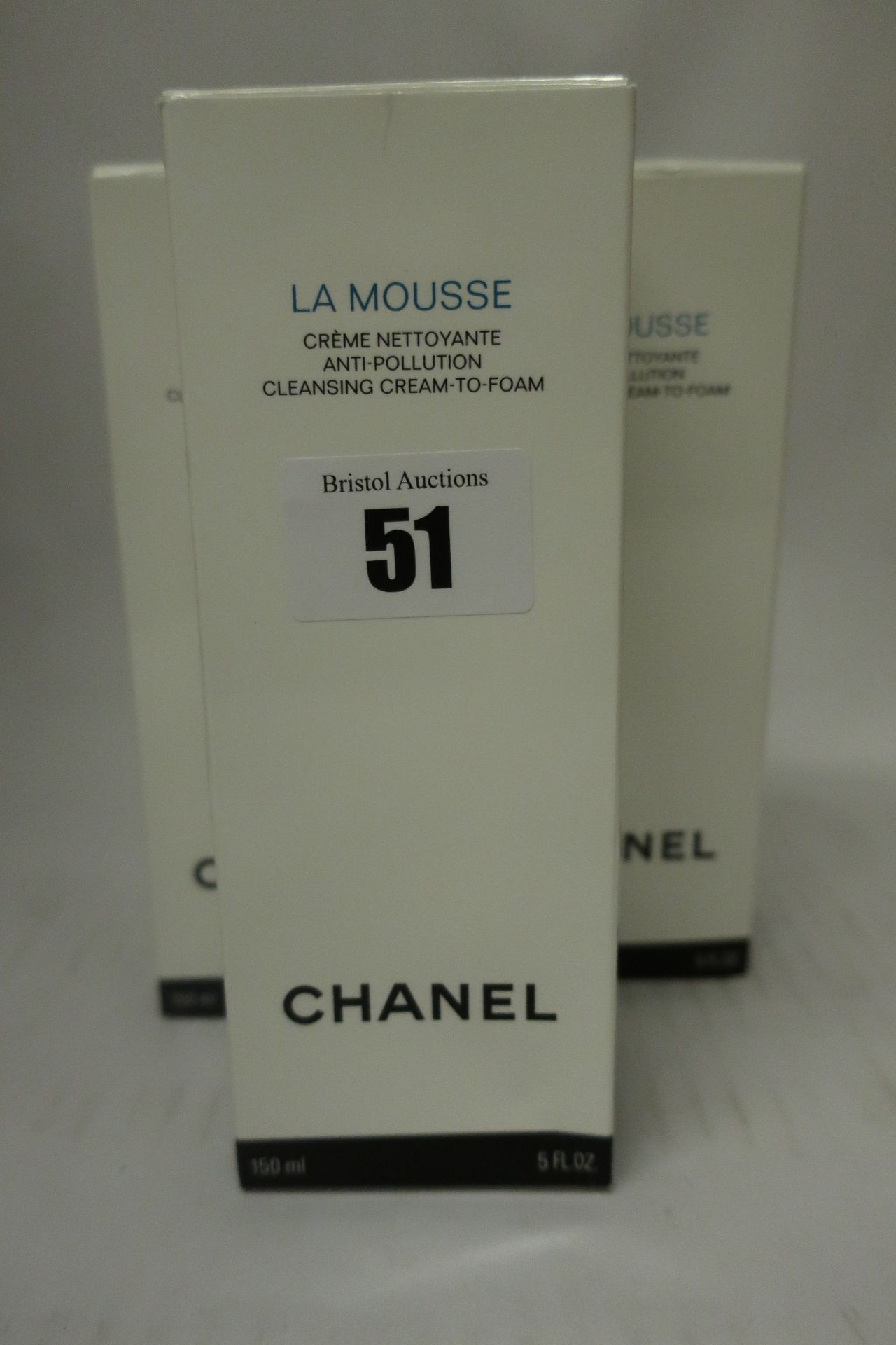 Three Chanel La Mousse anti-pollution cleansing cream to foam.