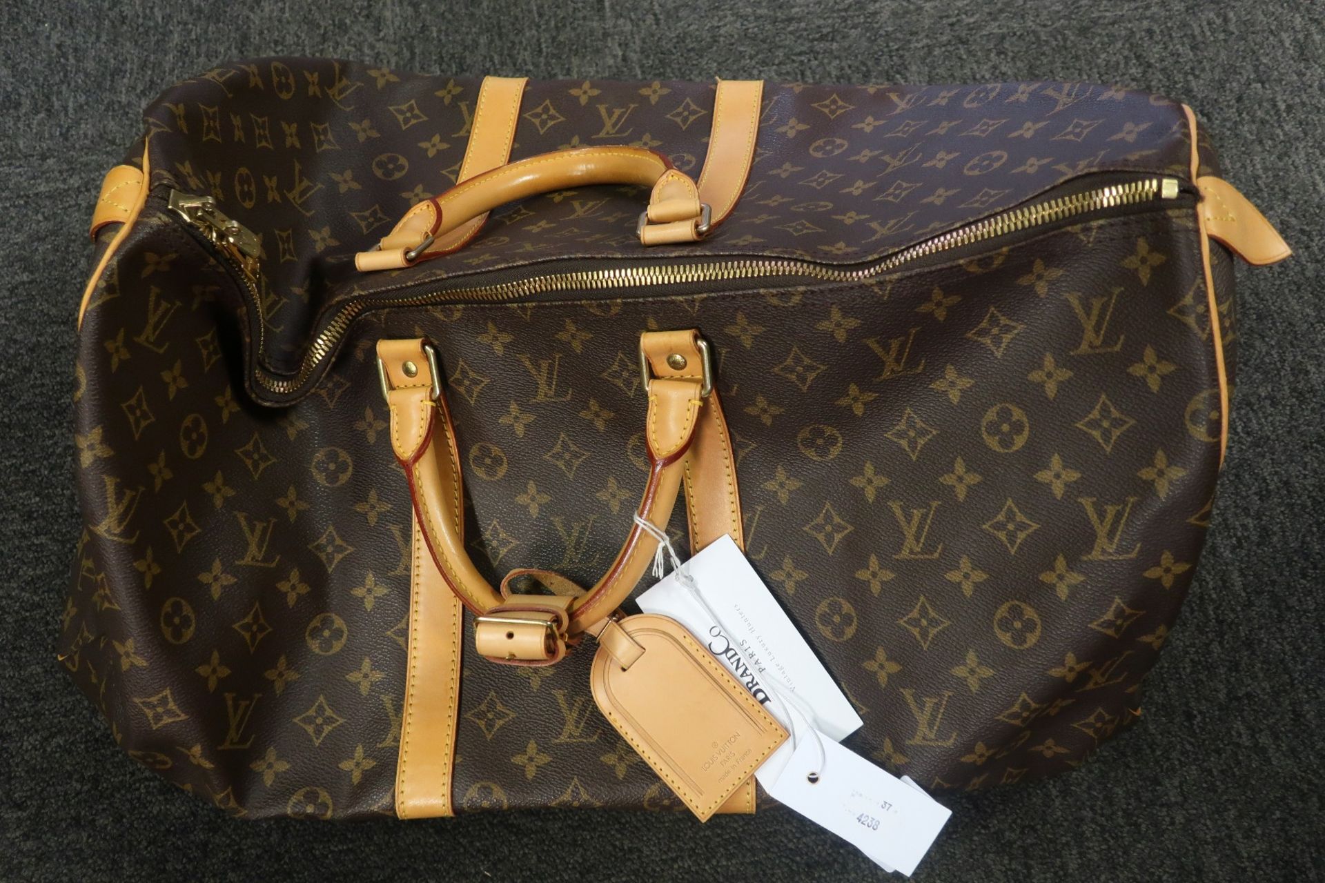 A pre-owned Louis Vuitton brown/gold holdall (Excellent condition). - Image 2 of 5