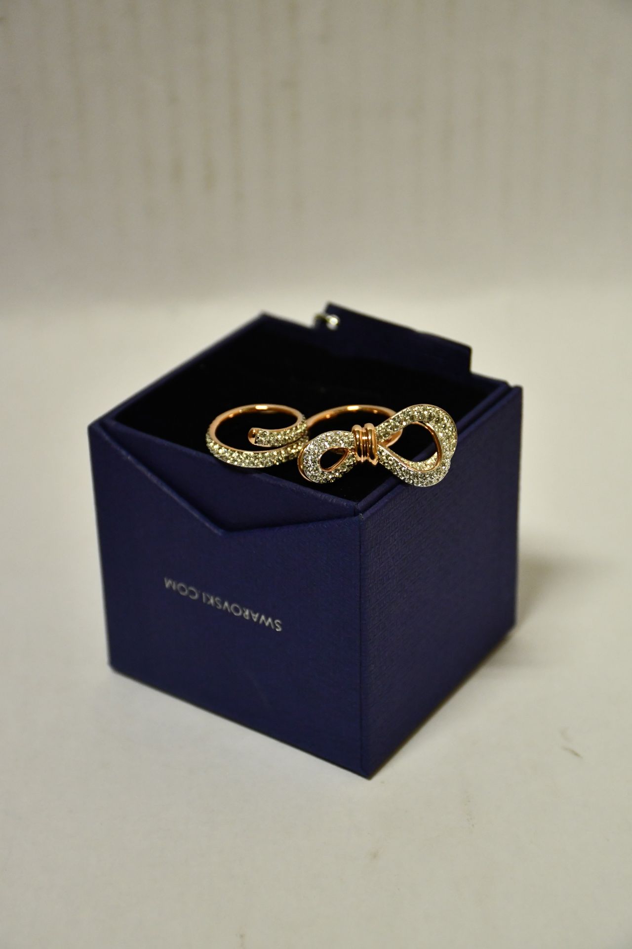 Two boxed as new Swarovski Lifelong Bow double rings 5474926 (Large 52+55).