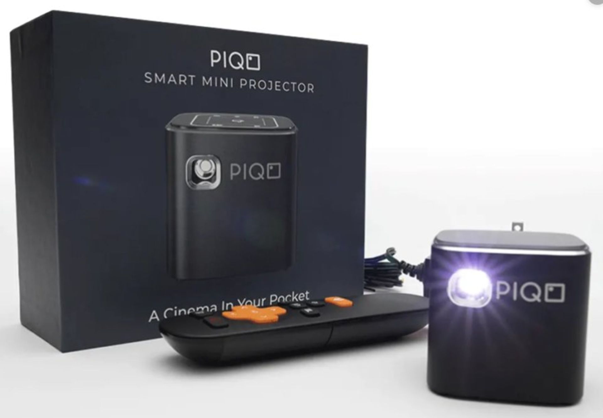 A boxed as new Piqo Smart Mini Projector. Powered by Android. Works with Apple AirPlay. Aux,