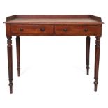 A mahogany ladies writing desk with three quarter gallery and two frieze drawers with carved
