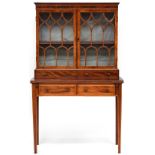 A Regency and later mahogany lady's writing desk of good patination, with glazed shelves and two