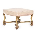 A 19th century upholstered giltwood stool, on acanthus leaf carved scroll supports with carved X