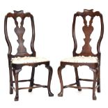 A pair of 19th century Queen Anne style carved walnut dining chairs with pierced vase splat, slip-in
