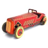A Metoy tinplate racing car c.1930s-40s, red, racing number '7', with poseable front wheels,