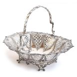 A silver swing handled basket, Martin, Hall & Co, Sheffield 1863, shaped oval form with leaf-