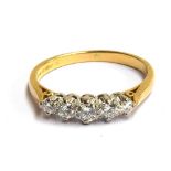 An 18ct ring with 5 old cut diamonds , gross weight 3.7, size S