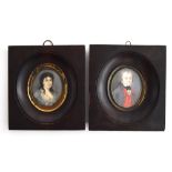 English School, circa 1790. Miniature portrait of a lady, bust-length, with long black hair and lace