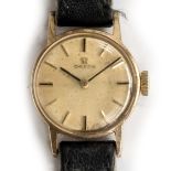 A LADIES 9CT GOLD OMEGA COCKTAIL WATCH *NOT RUNNING* CHAMPAIGN DIAL WITH BATON MARKES. Movement:
