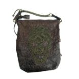 Large brown leather shoulder bag from Thomas Wyld with skull of studs on one side and two zipped