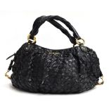 Black woven leather handbag from Mui Mui, twisted leather handles attached with heavy brass hoops,