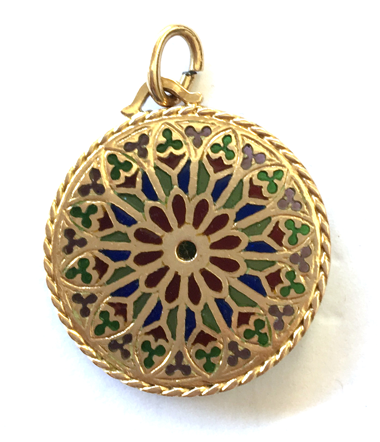 Gold pendant with faded marks (tests as 18ct) in a round filigree form inset with stones/glass