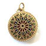 Gold pendant with faded marks (tests as 18ct) in a round filigree form inset with stones/glass