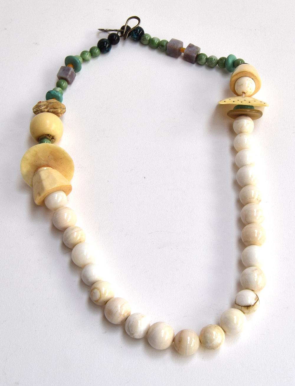 Unusual necklace from Clouds, Woodstock, USA featuring various beads including a Nesuke rabbit and a - Image 2 of 2