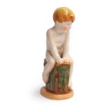 'Sea-Urchin', a mid 20th century Royal Worcester figure modelled by Margaret Cane as a naked boy