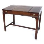 An 18th century and later mahogany counting desk, the central part opening to reveal fitted