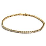 An 18ct gold bracelet with 70 round set diamonds (approx 1ct), length 19cm, gross weight 7g