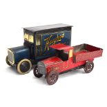 An early tinplate clockwork flatbed lorry, red with yellow trim, in good condition, 18cmL,