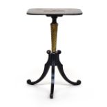 An early 19th century ebonised and gilt rectangular tripod table, with marbleised top on spirally
