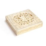 A Canton ivory box, the square sliding top enclosing various geometric panels, pierced and carved
