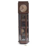 An oak cased modernist wall clock