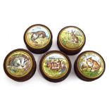 A set of five modern enamel topped wooden circular boxes, the tops painted brown hare, badger,