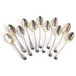 A set of 11 crested Old English pattern silver teaspoons, maker's mark W.C, London 1819, 8.6oz