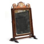 A small regency dressing mirror, with gilt surround and gilt shell cresting Provenance: from the