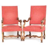 A pair of 17th century style Franco-Flemish walnut armchairs, carved and upholstered, 19th century