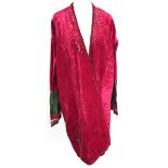 Silk velvet Turkman coat, deep pile, trimmed with silk braid and embroidery and tufts of animal fur,