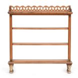 A provincial oak three tier bookcase with pierced sides, 63cmW Provenance: from the estate of
