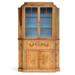 A George III painted bookcase cabinet, with tablet cresting and astragal glazed doors flanked by