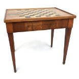 An 18th century French chess table, the board of inlayed ebony, with raised moulded edge, the top