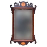A Georgian style mahogany framed mirror inlaid with stylised paterae, 66cmH Provenance: from the