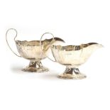 A pair of silver sauce boats, Goldmiths & Silversmiths Company, Birmingham 1923, 8.3oz