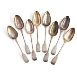 A set of eight George IV silver fiddle pattern table spoons, crested, by William Eley & William