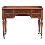 A Victorian ladies writing table, three quarter galleried top, above single draw flanked by four